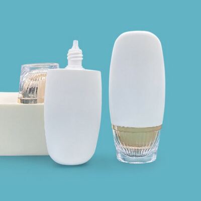 50ml 타원형 럭셔리 골드 자외선 차단기 병 - 피부 관리를 위한 고급 화장품 플라스틱 병